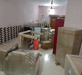 Household goods wrapped and staged before loading