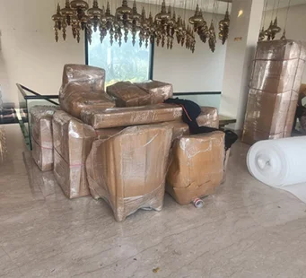 Chair packed in protective foam sheeting